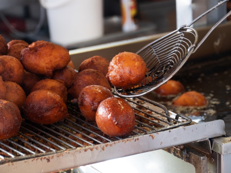 Quarkballchen on a grill at a Christmas market