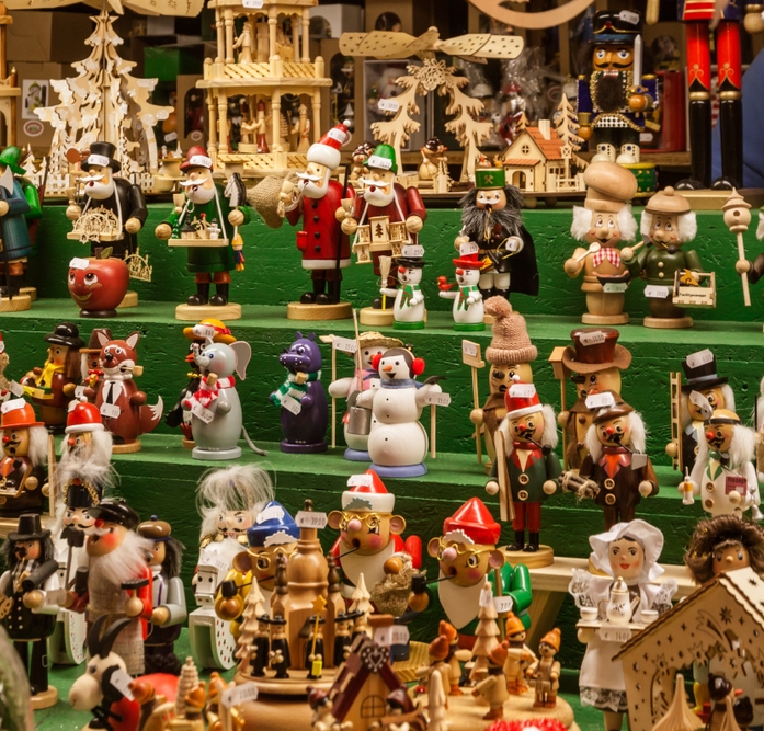 Dozens of tiny wooden figurines at a market stall in Dresden