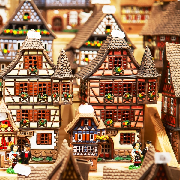 A close-up of toy model-sized Alsatian homes available for purchase at Strasbourg's market