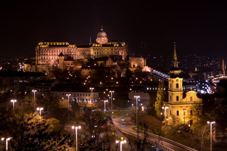 Buda Castle in Budapest, shown aglow at night