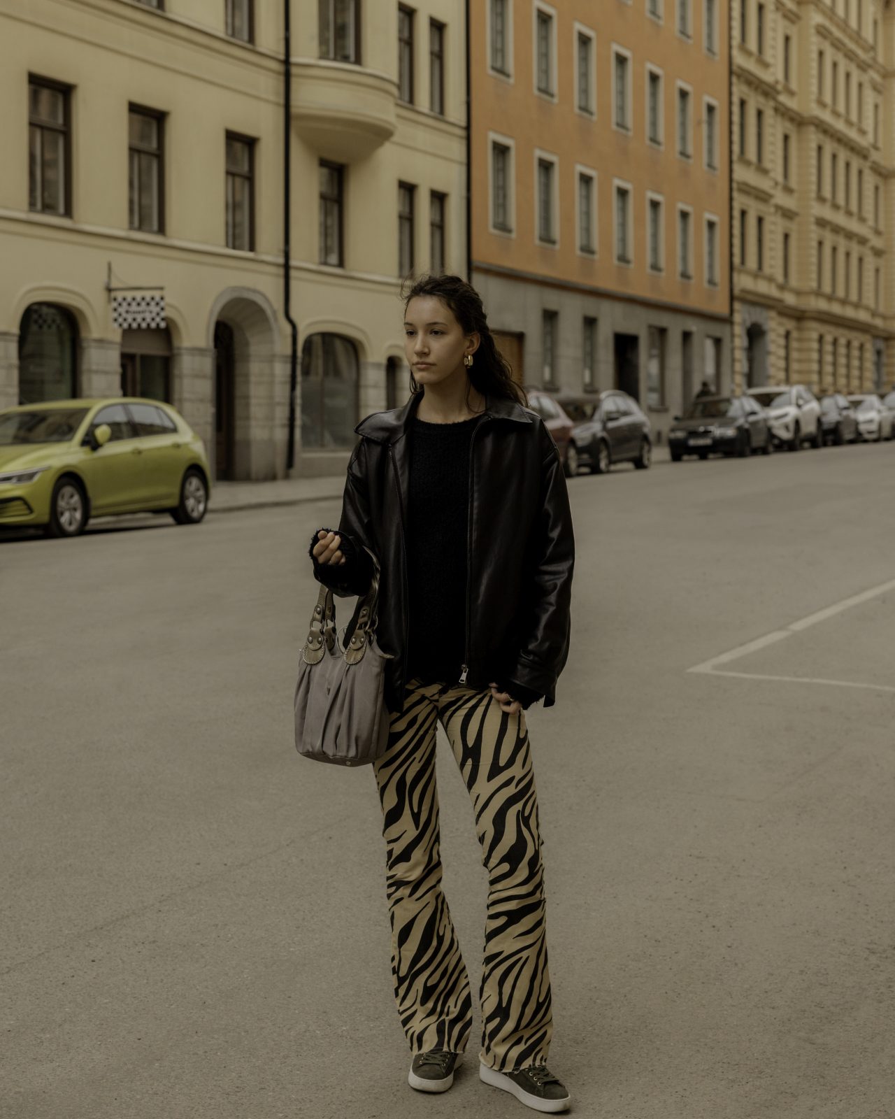 A woman posing on a street in Stockholm, Sweden